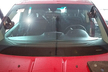 Dan Dan, the Auto Glass Man - Grand Rapids MI - Working on Windshield - 1